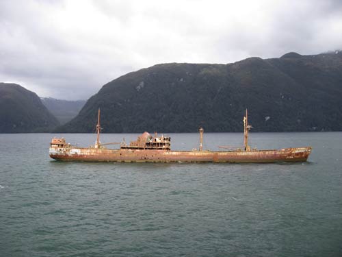 Old sugar freighter stuck on the only rock for miles in water 2000 feet deep 
