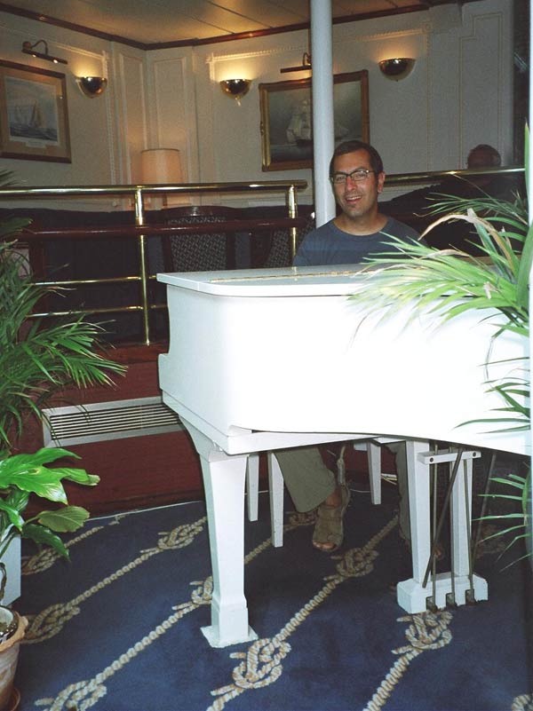 Mark at the ship's piano